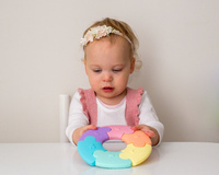 Pierwsze puzzle sensoryczne dla niemowlaka kółko Jellystone Design pastelowe, OUTLET