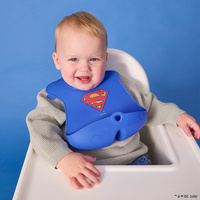 Superman by b.box Zwijany śliniak silikonowy z otwartą kieszonką – miękki śliniak dla dziecka i niemowlaka