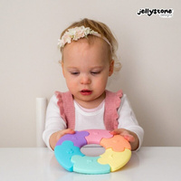 Pierwsze puzzle sensoryczne dla niemowlaka kółko Jellystone Design pastelowe