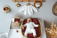 Przewijak dla dzieci z liści palmowych, Kikadu