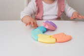 Pierwsze puzzle sensoryczne dla niemowlaka kółko Jellystone Design pastelowe, OUTLET